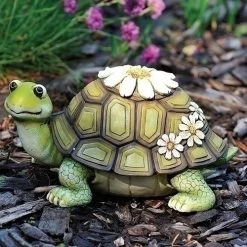 Green Turtle With White Daisy Flowers Garden Statue